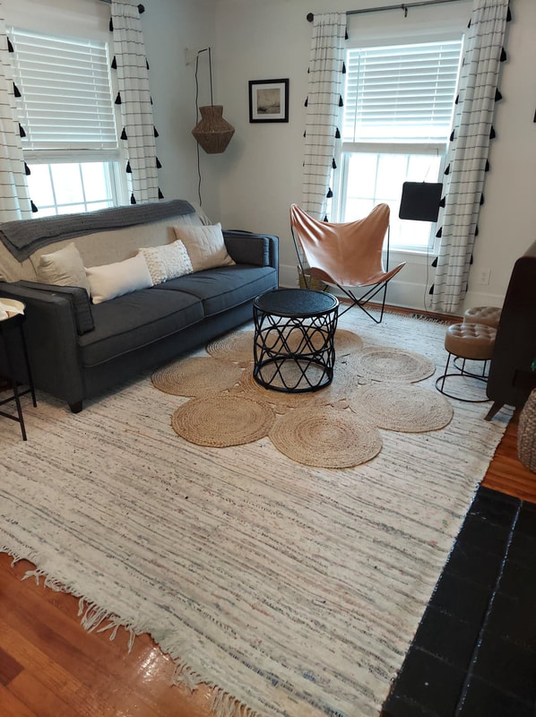 Clean living room in AirBnB property